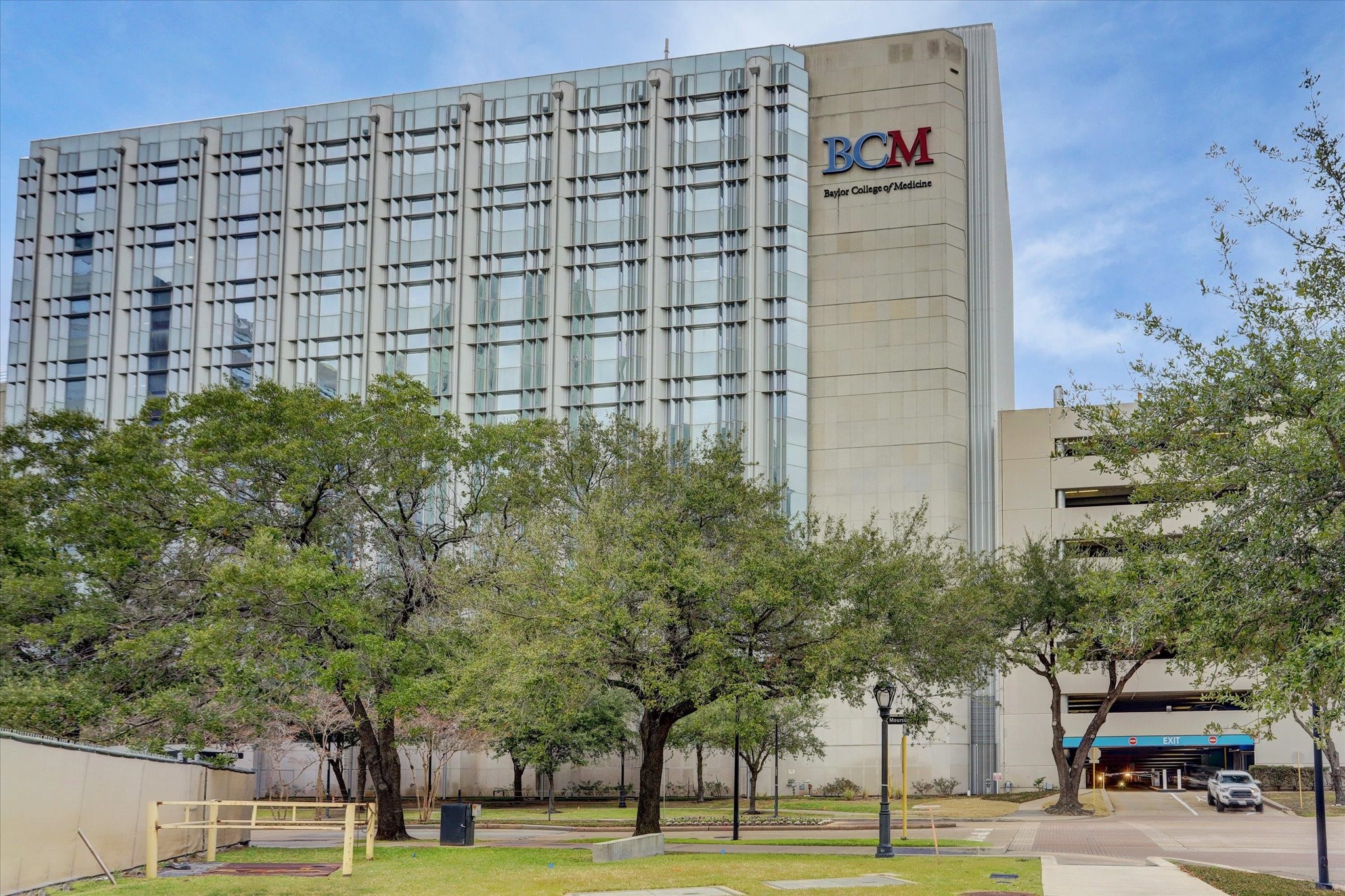 8100 Cambridge Street, Unit 123 Houston, TX 77054 - Photo 5 of 31 a view of a building with a garden