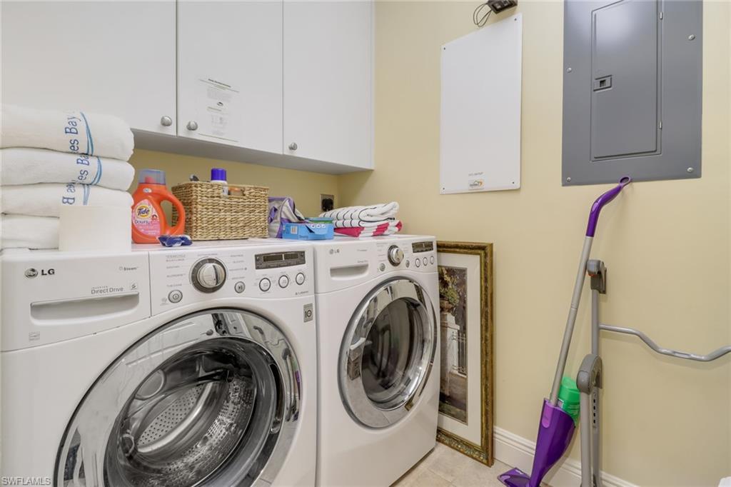985 Sandpiper Street, Unit I204 Naples, FL 34102 - Photo 29 of 45 a utility room with dryer and washer