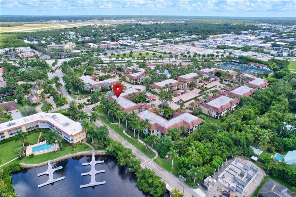 985 Sandpiper Street, Unit I204 Naples, FL 34102 - Photo 40 of 45 an aerial view of multiple house