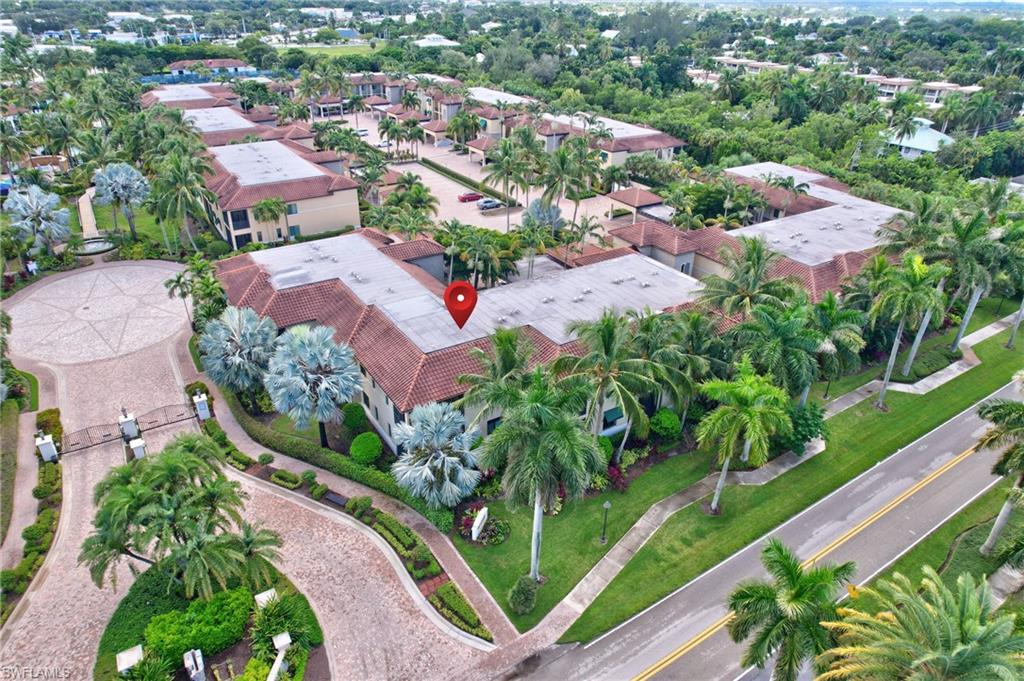 985 Sandpiper Street, Unit I204 Naples, FL 34102 - Photo 43 of 45 an aerial view of a house with a garden