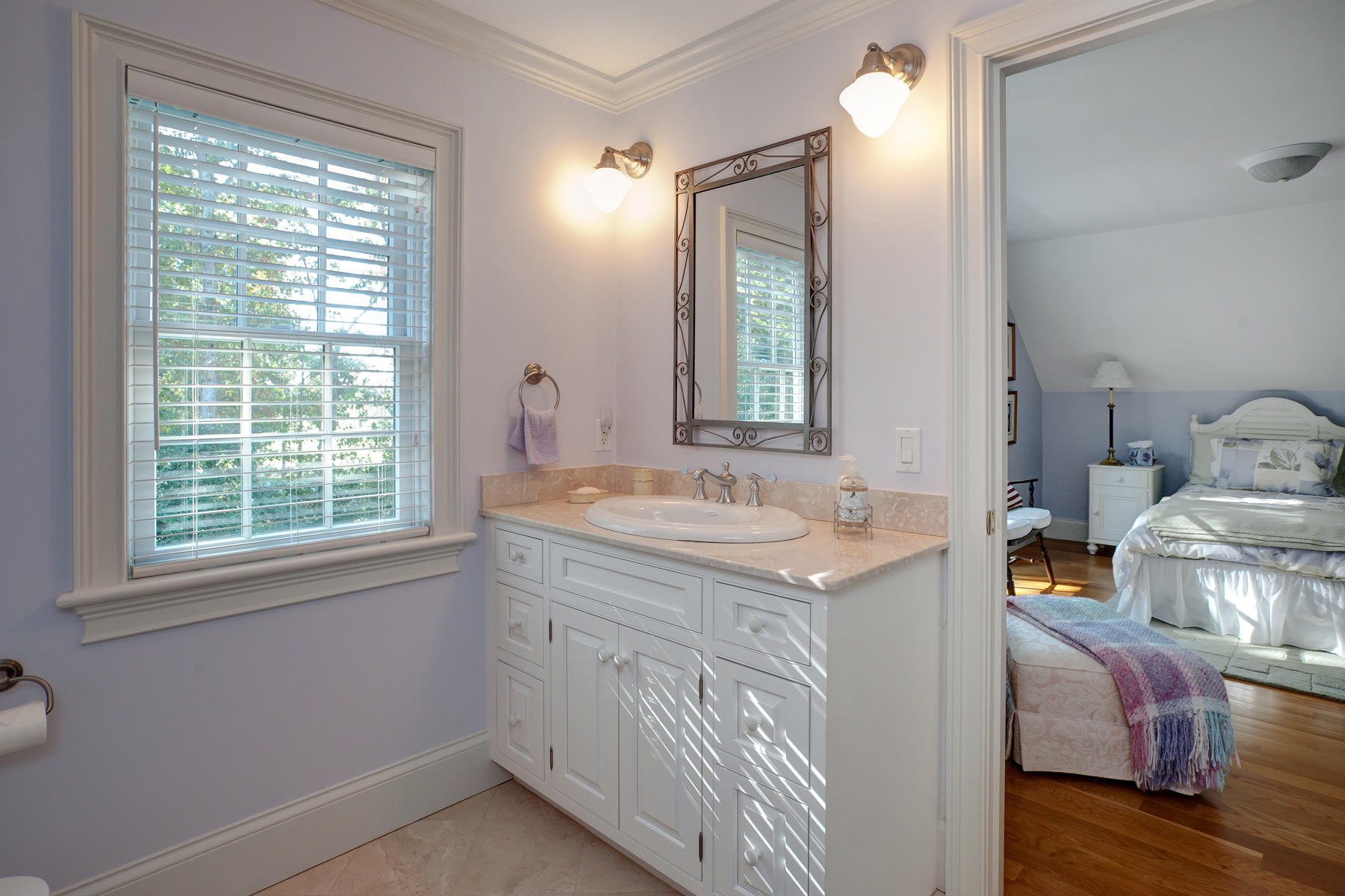 255 Parker Road Osterville, MA 02655 - Photo 19 of 34 a bathroom with a sink a vanity and a mirror