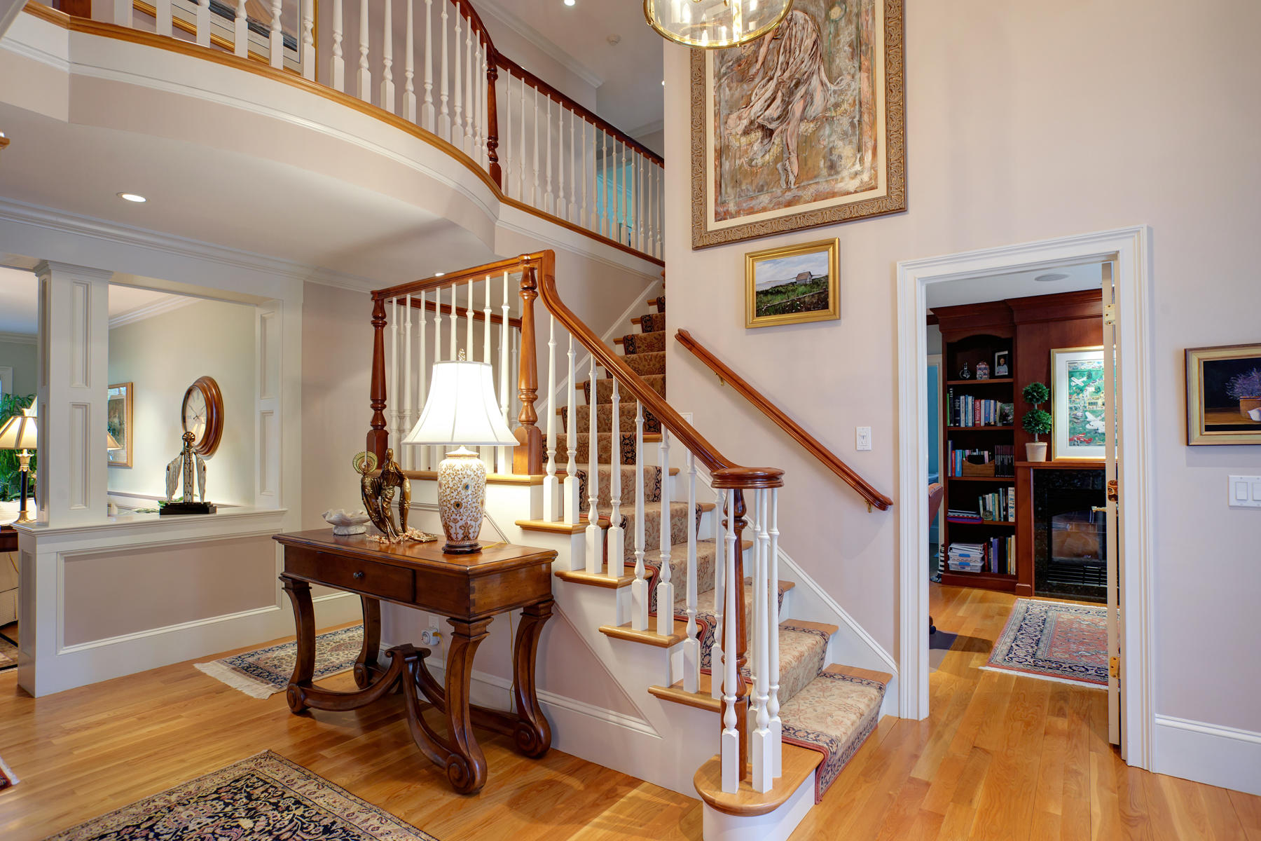 255 Parker Road Osterville, MA 02655 - Photo 2 of 34 a view of a livingroom with furniture and staircase