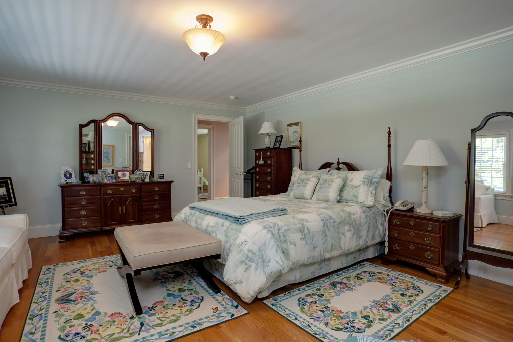 255 Parker Road Osterville, MA 02655 - Photo 23 of 34 a bed room with a bed window and a chair