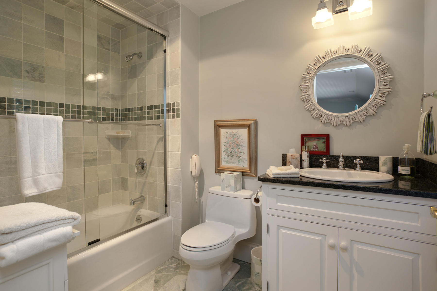 255 Parker Road Osterville, MA 02655 - Photo 27 of 34 a bathroom with a sink a toilet and a mirror