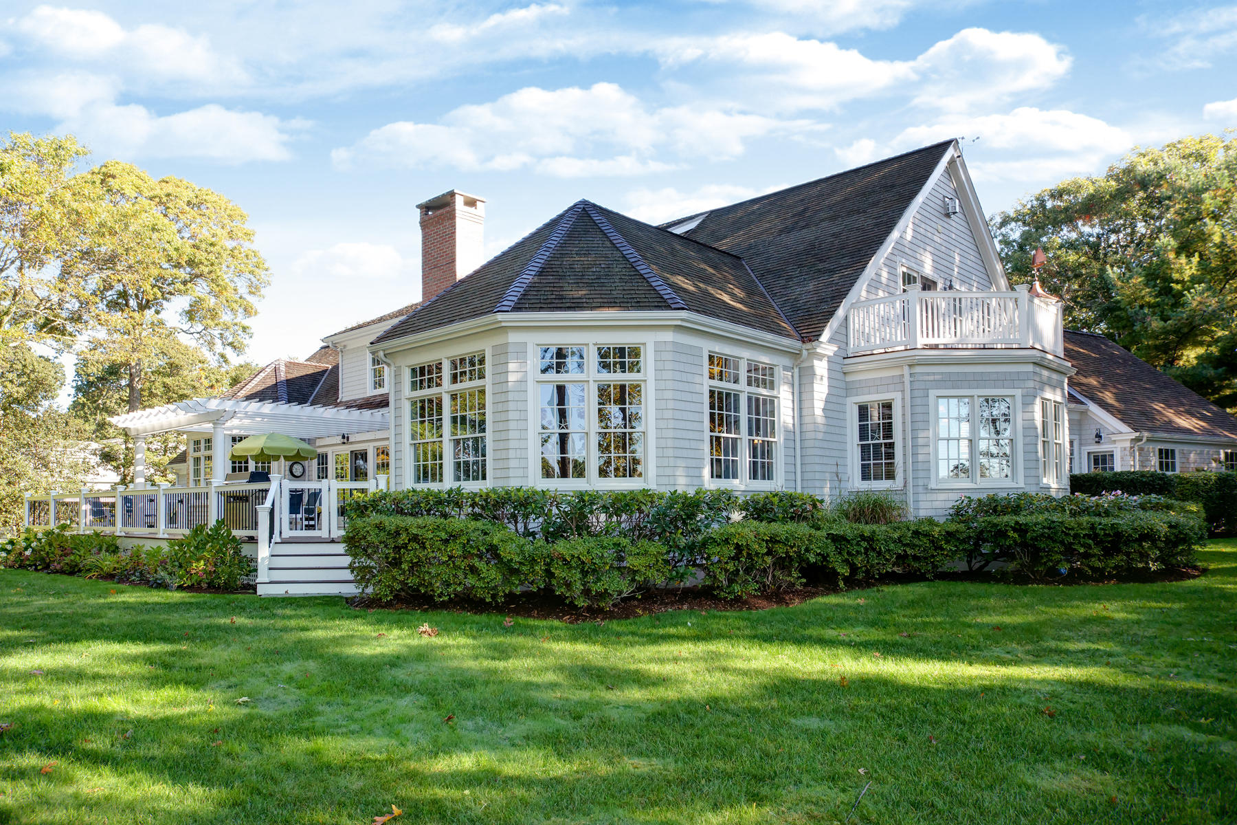 255 Parker Road Osterville, MA 02655 - Photo 31 of 34 a front view of a house with a yard