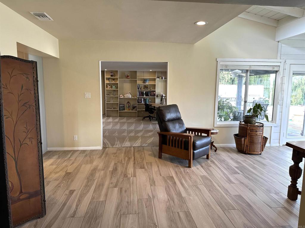 1001 Riverview Drive Fallbrook, CA 92028 - Photo 15 of 36 a living room with furniture and a wooden floor
