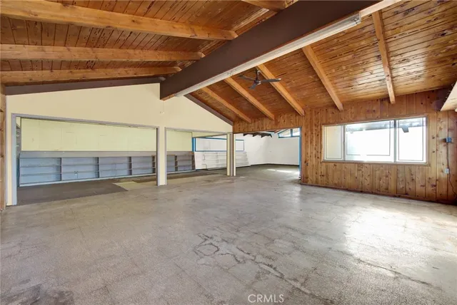 a front view of a house with a garage