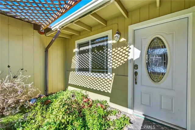 a kitchen with stainless steel appliances a sink and a refrigerator