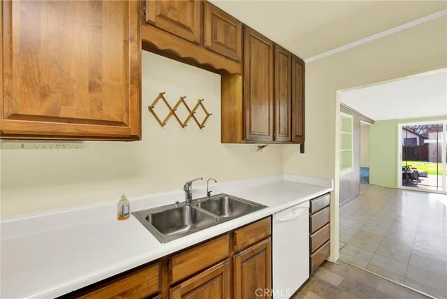 a view of a balcony with wooden floor and fence