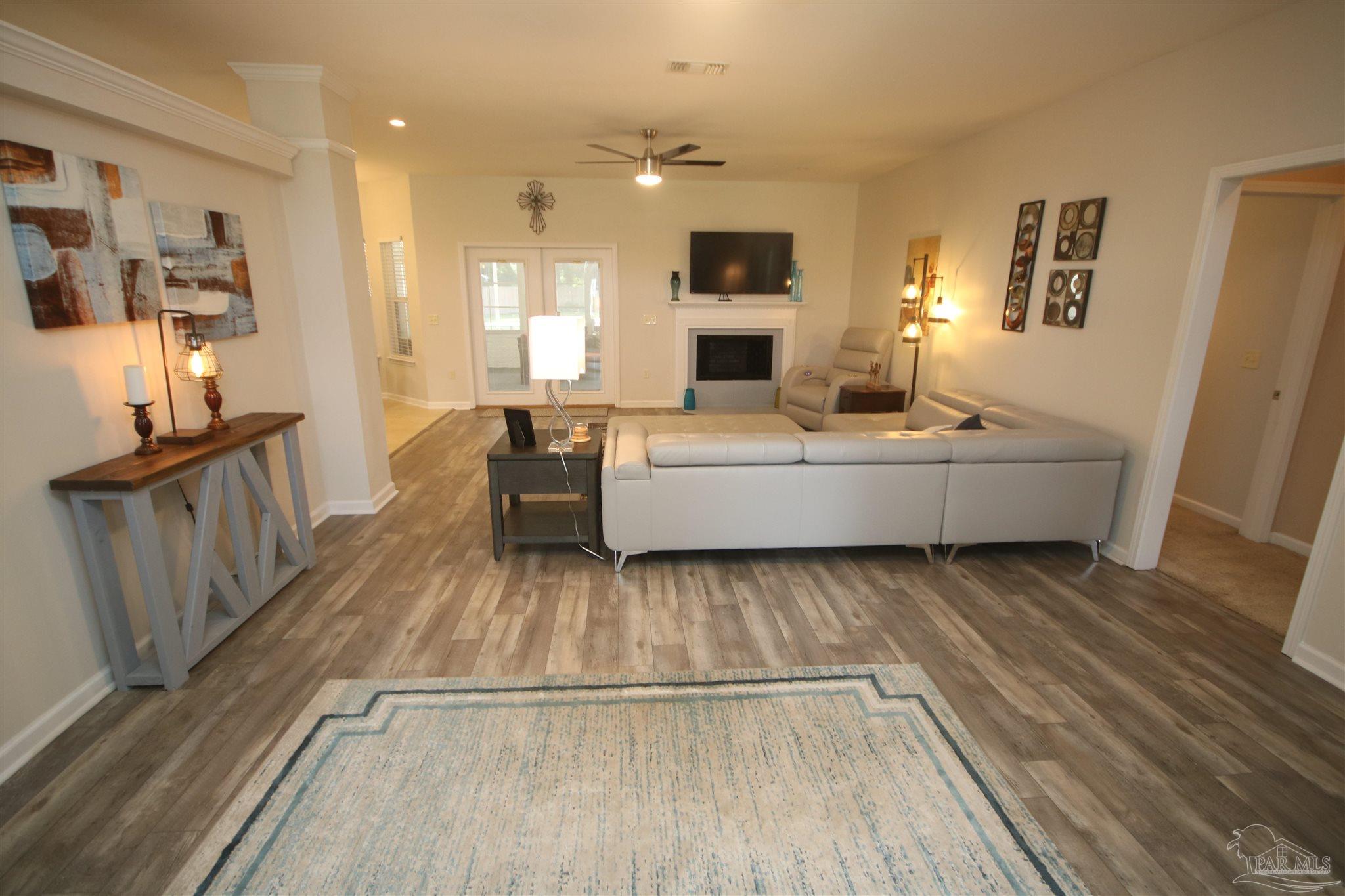 5895 Quintette Road Pace, FL 32571 - Photo 12 of 67 with wood burning fireplace.