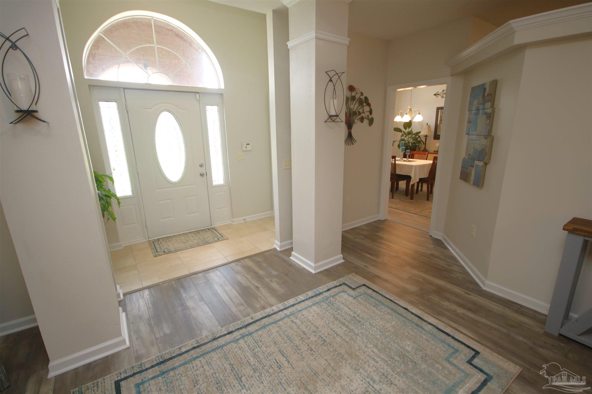 5895 Quintette Road Pace, FL 32571 - Photo 25 of 67 the formal dining room from the family room.