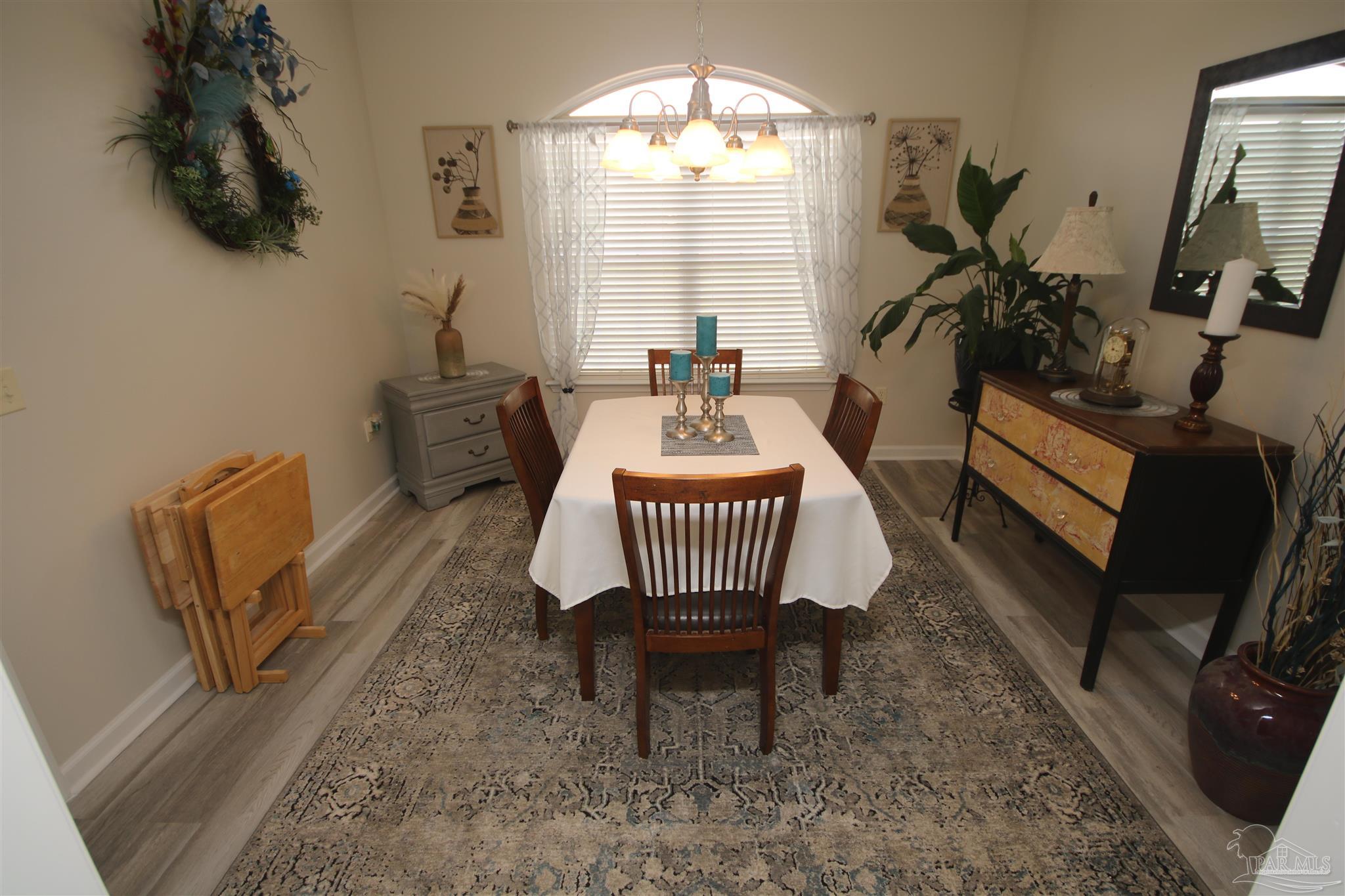 5895 Quintette Road Pace, FL 32571 - Photo 27 of 67 is 11'6" x 12'. Double window w/ transom.