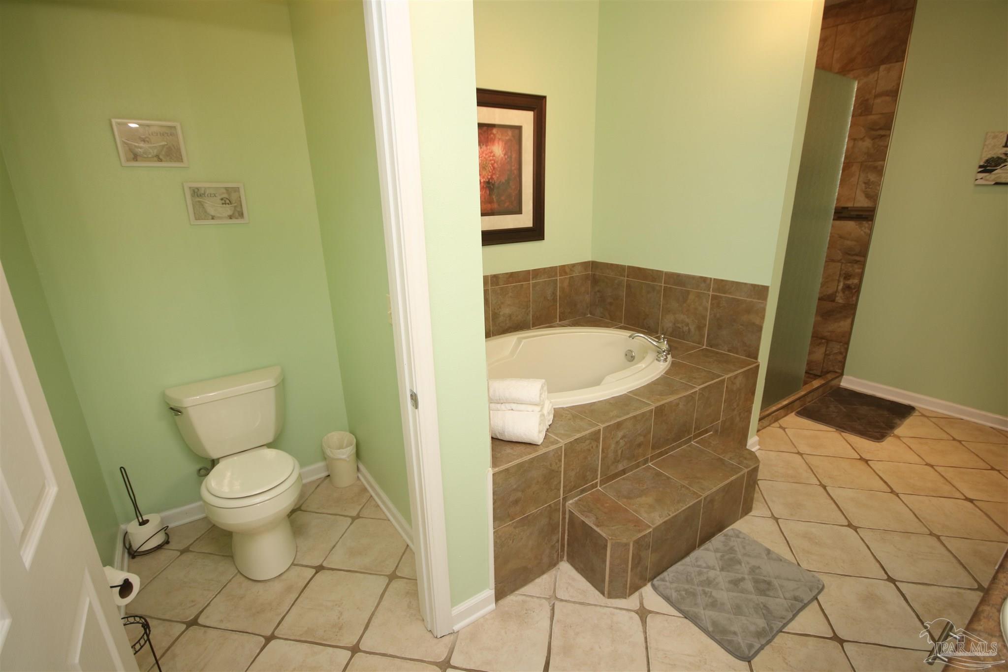 5895 Quintette Road Pace, FL 32571 - Photo 35 of 67 Deep Soaker garden tub. Linen closet by shower.