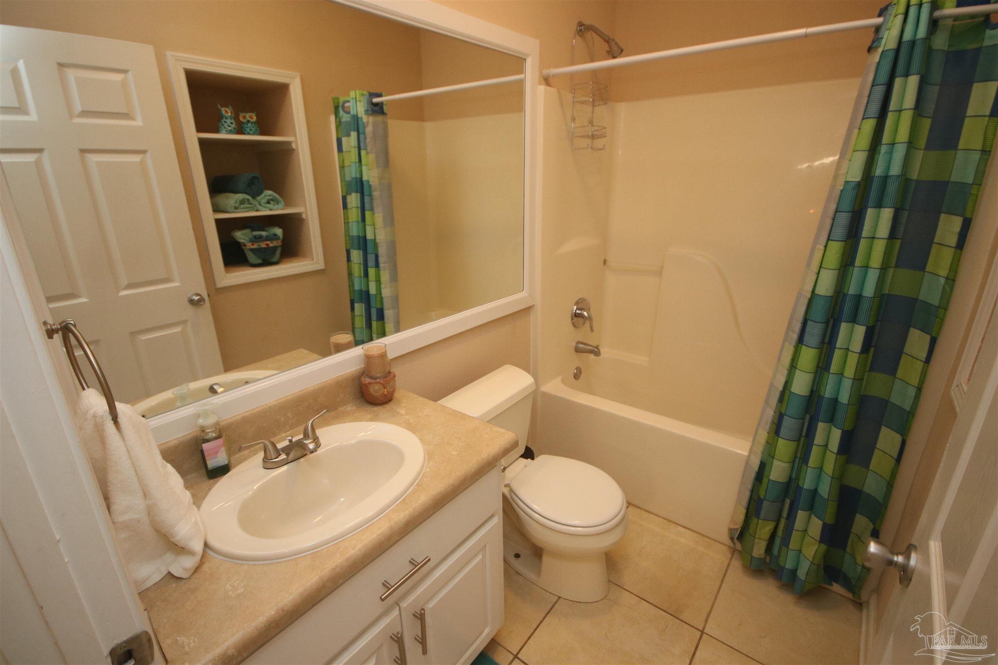 5895 Quintette Road Pace, FL 32571 - Photo 40 of 67 bedrooms 1 & 2 boast a large custom framed mirror.