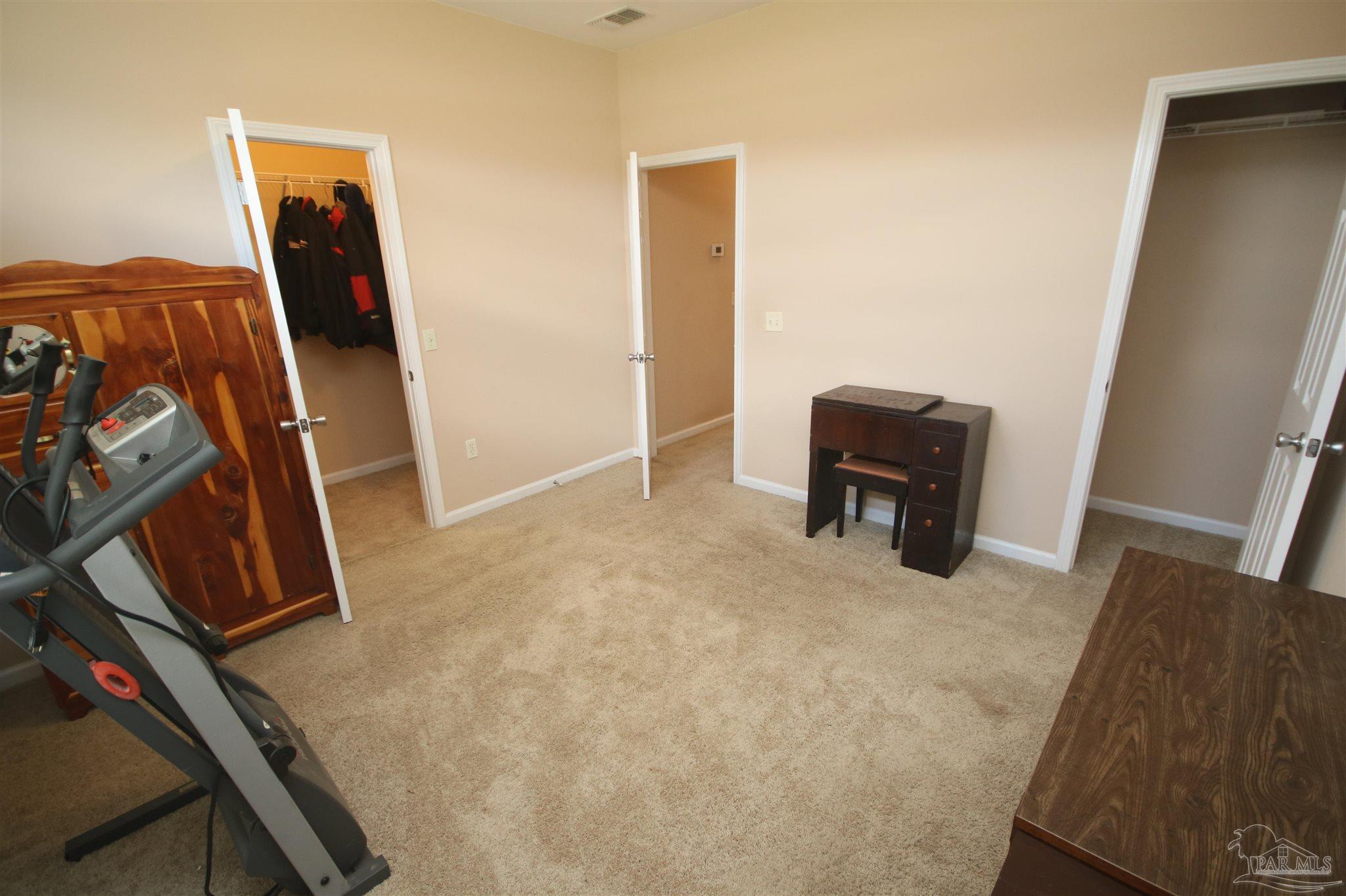 5895 Quintette Road Pace, FL 32571 - Photo 43 of 67 enjoys 1 walk in lighted closet & a 2nd closet.