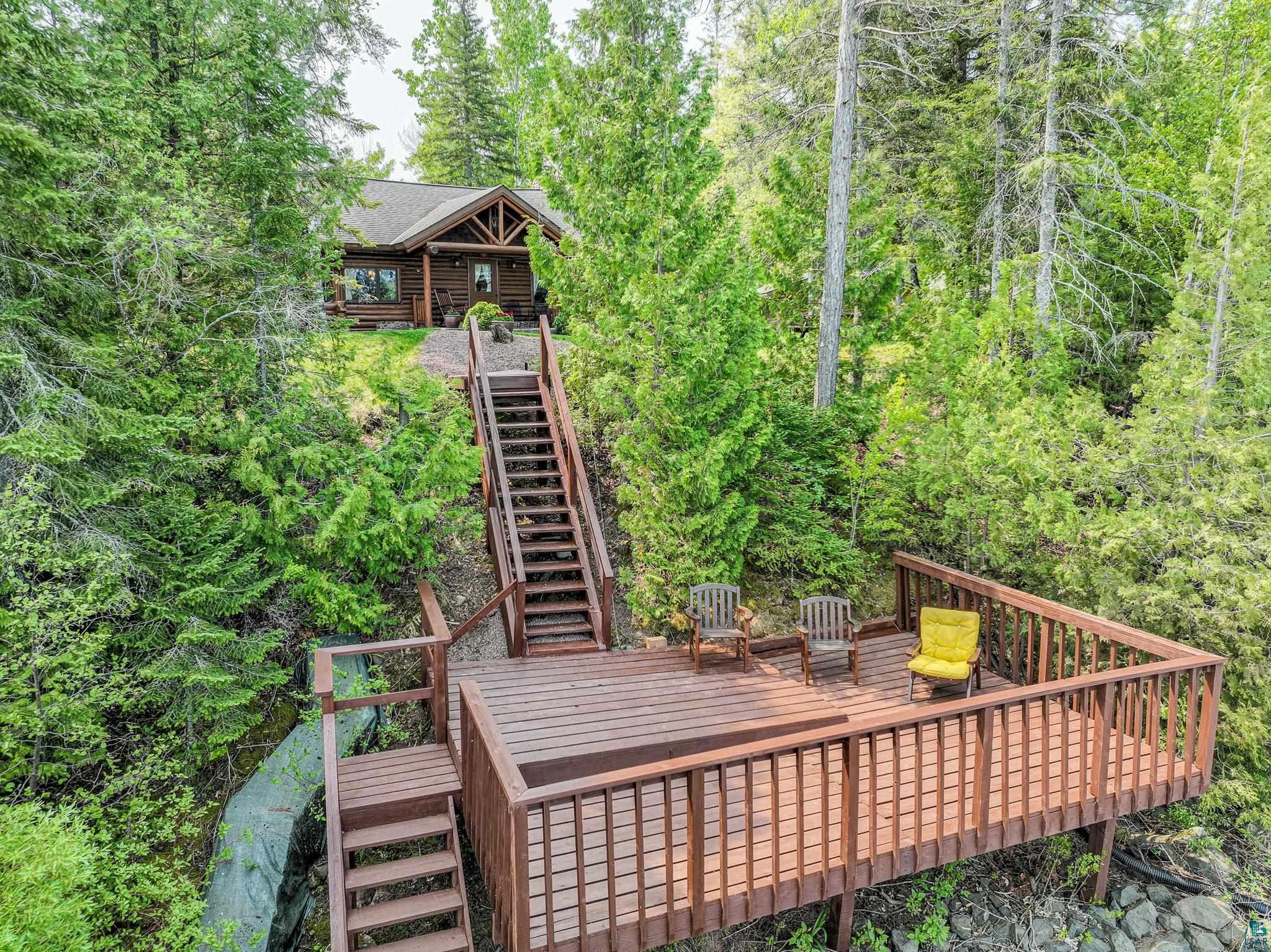 55285 Corbine Road Ashland, WI 54806 - Photo 43 of 44 Stair and deck overlooking Lake Superior
