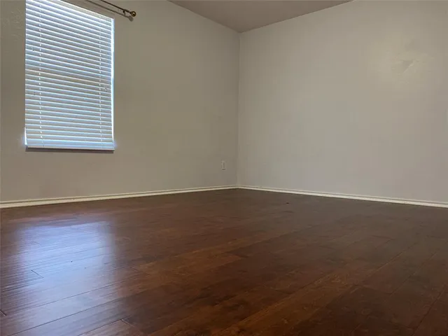 a swimming pool with outdoor seating and yard