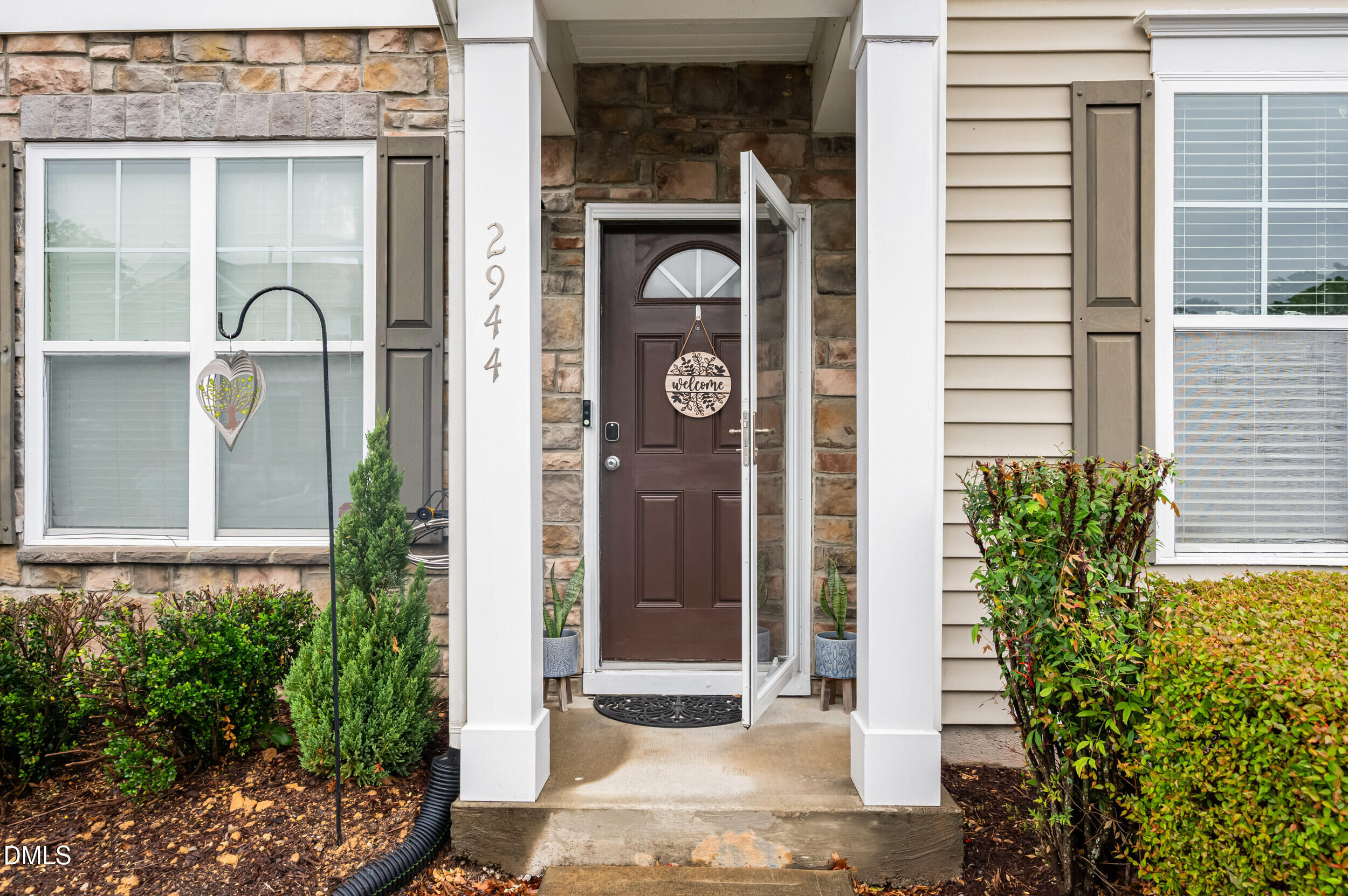 2944 Casona Way Raleigh, NC 27616 - Photo 2 of 24 a front view of a house with a yard