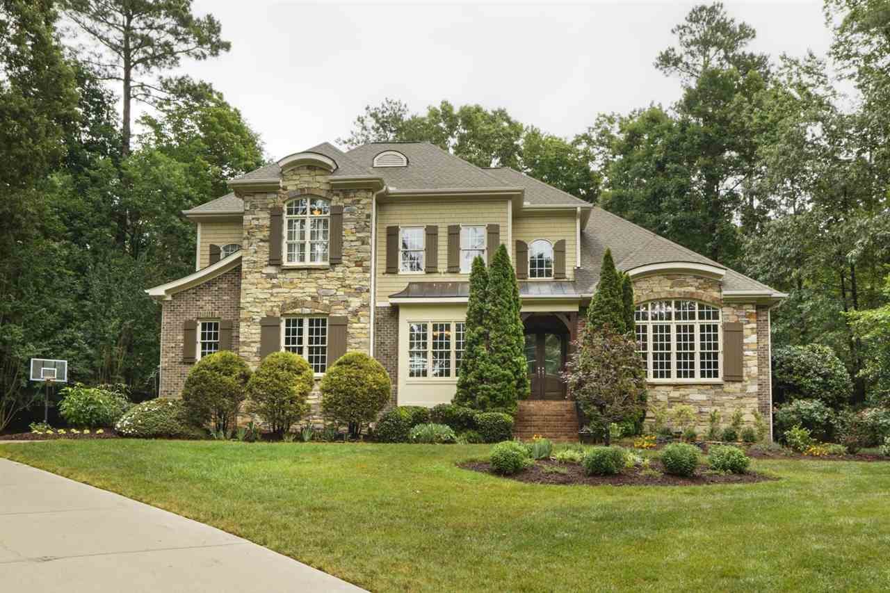 1408 Caistor Lane Raleigh, NC 27614 - Photo 15 of 18 Gorgeous custom home on just over an acre in The Moorlands. Soaring ceilings greet you with abundant light & a beautiful OFFICE. Bright open floor plan w/state of the art kitchen; new TILE flooring, GRANITE and STAINLESS appliances -A must see! Exterior Front