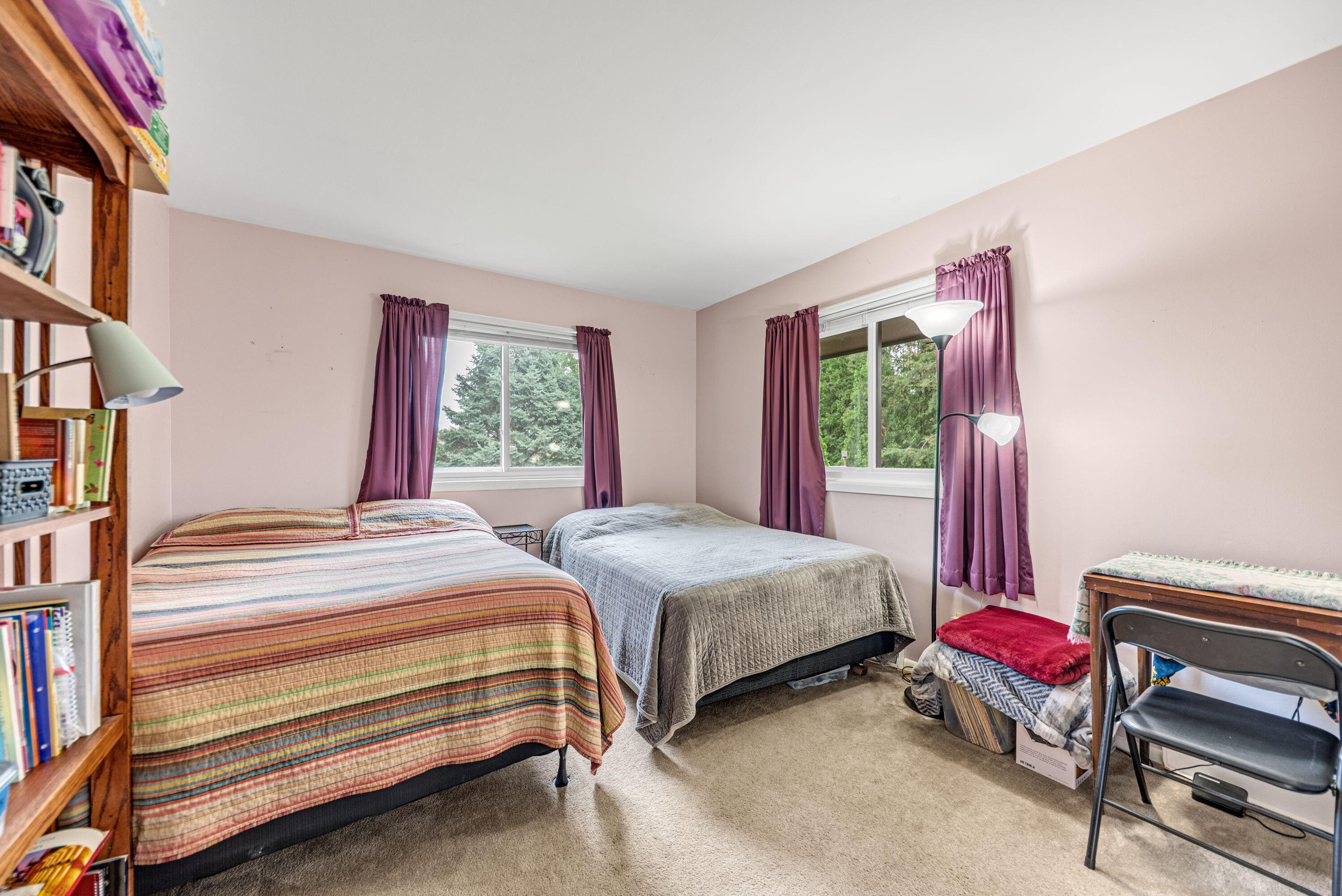 2337 Four Seasons Parkway Crown Point, IN 46307 - Photo 8 of 18 a bedroom with a bed and a chandelier