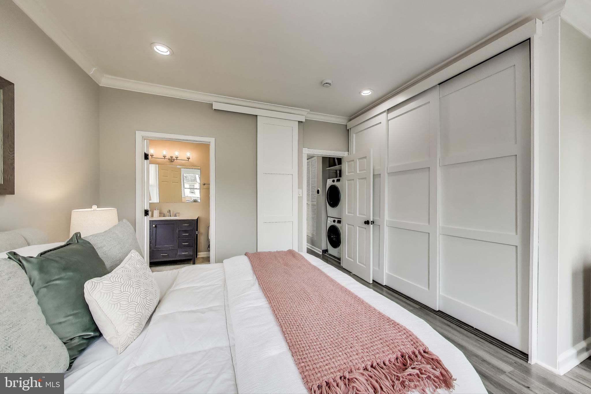 1415 G Street Southeast Washington, DC 20003 - Photo 14 of 42 a bed room with a bed and a window