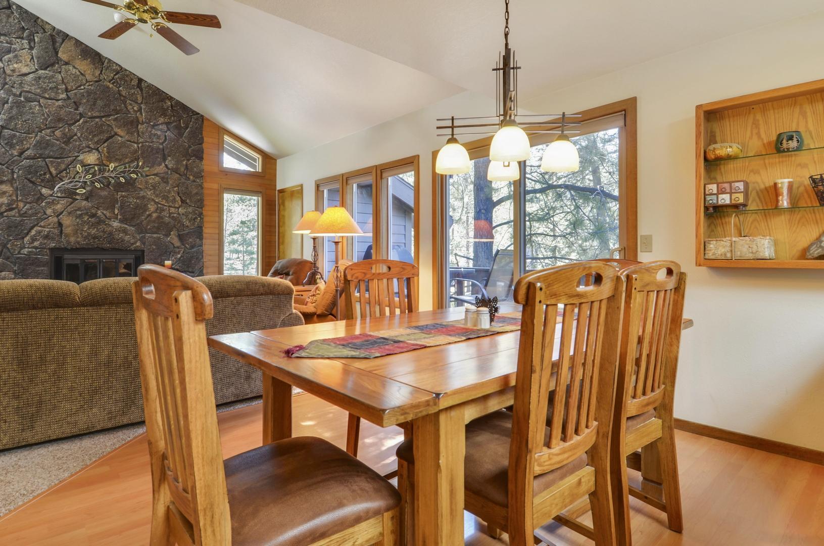 57301 Beaver Ridge Loop, Unit 10 Sunriver, OR 97707 - Photo 7 of 23 a view of a dining room with furniture window and outside view