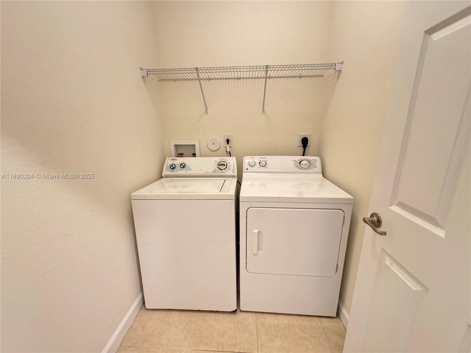 11291 Southwest 240 Lane Homestead, FL 33032 - Photo 8 of 22 a utility room with dryer and washer