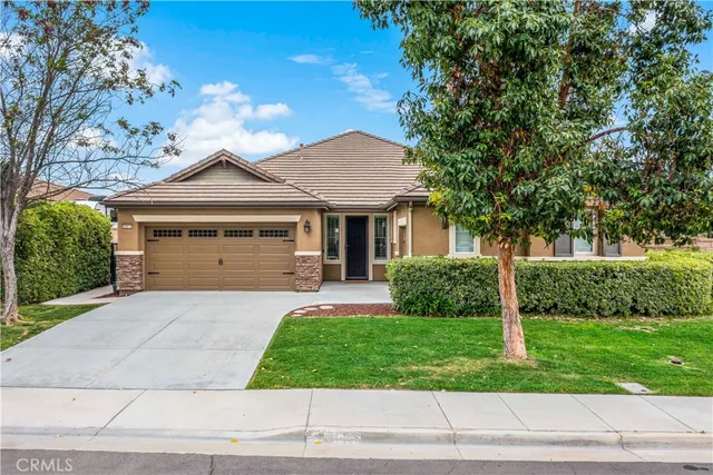 front view of a house and a yard