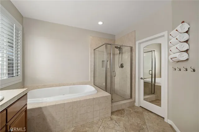 an aerial view of a house with a lake view