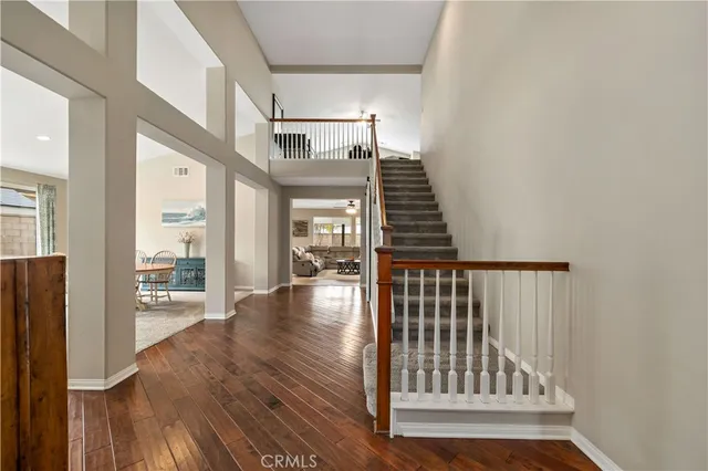 a view of entryway with wooden floor