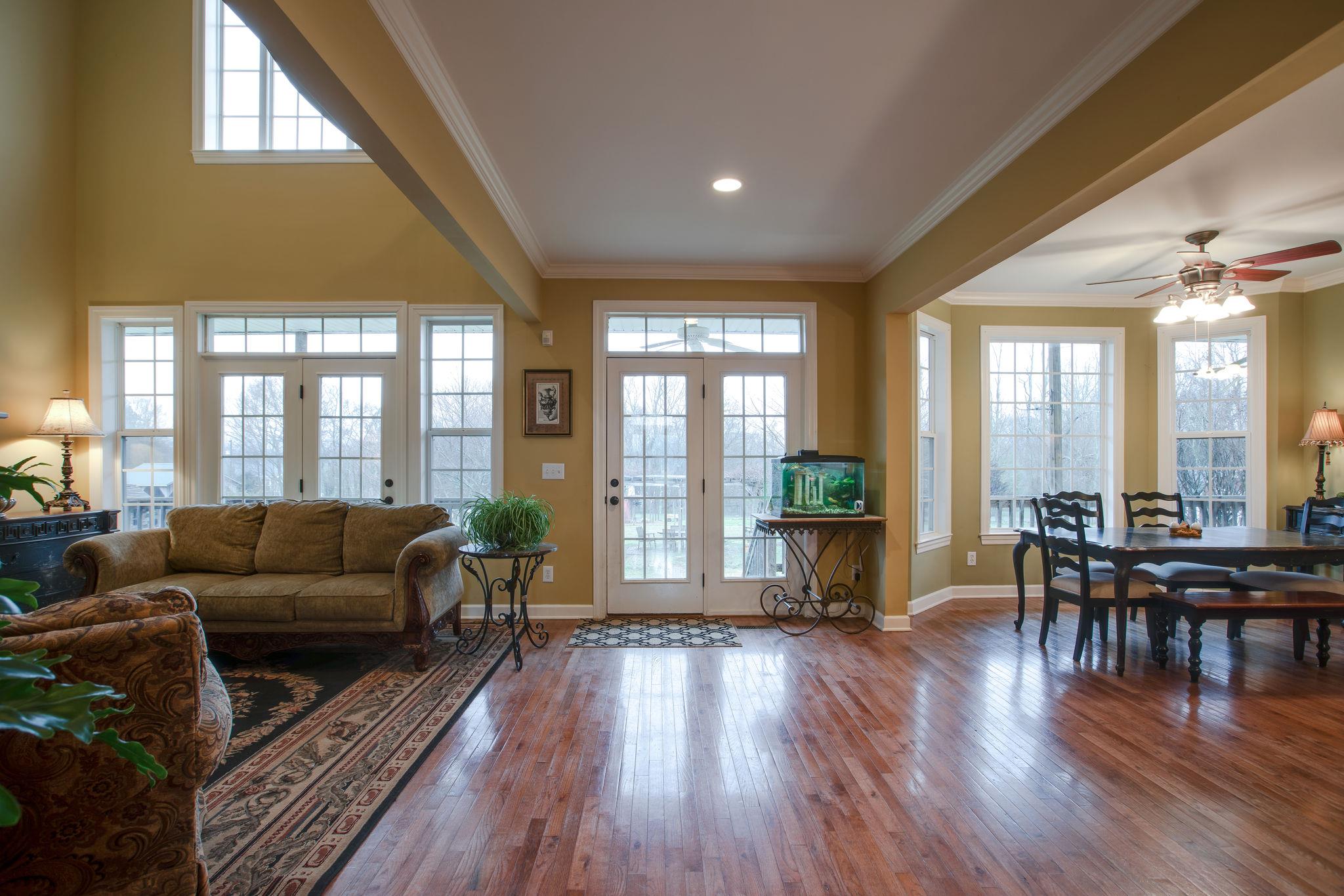 9552 Mullins Road Arrington, TN 37014 - Photo 7 of 30 Light and bright and open living room and kitchen.