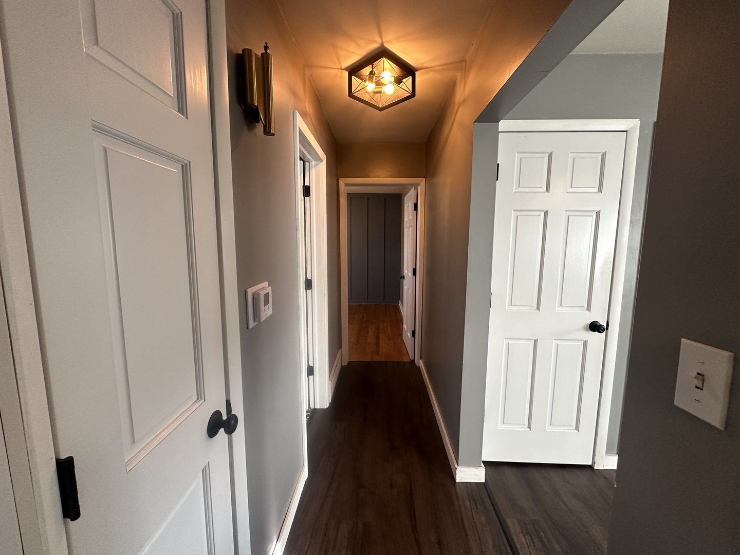 412 East Main Street Morrison, IL 61270 - Photo 12 of 23 a view of a hallway with wooden floor