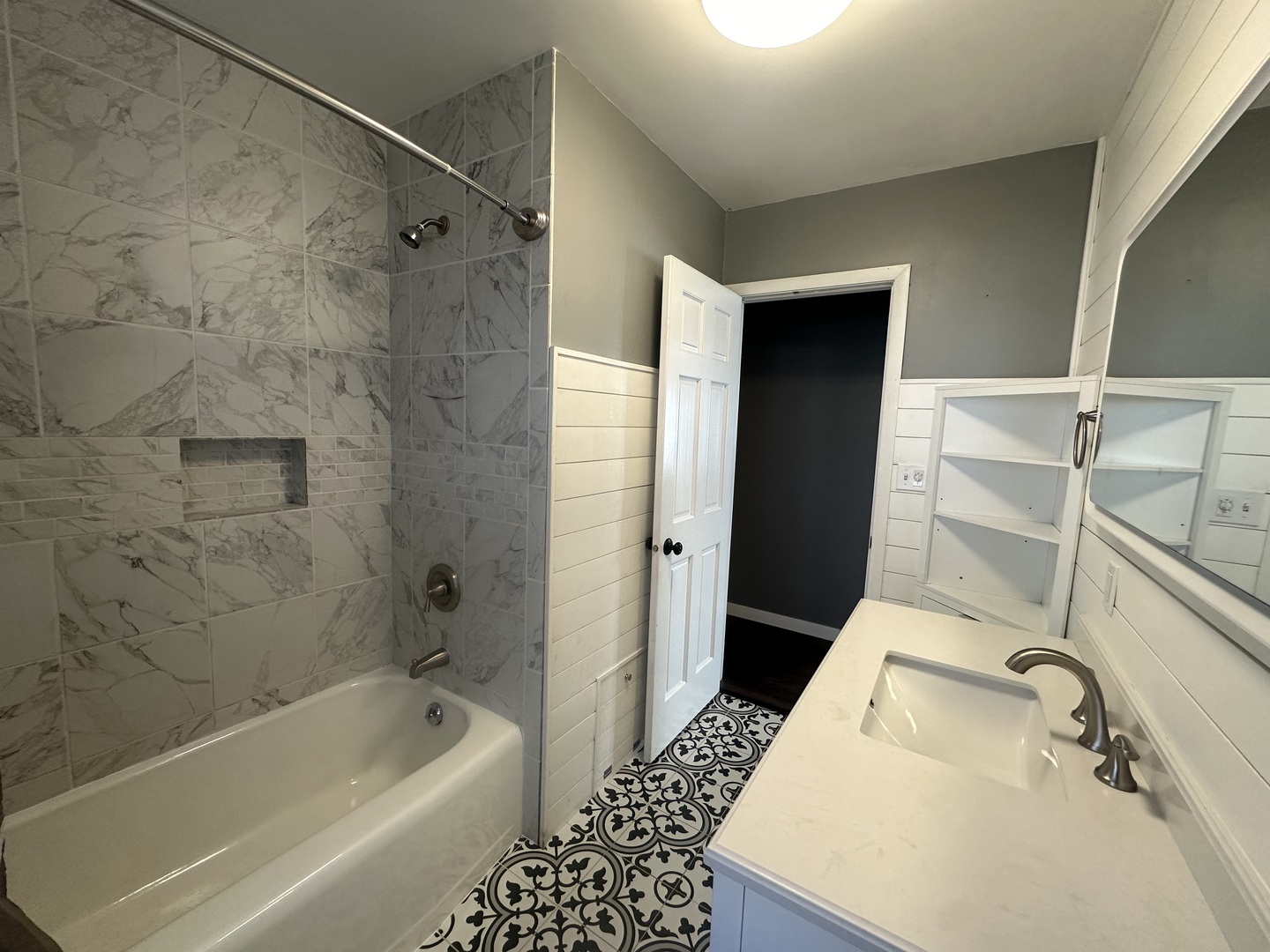 412 East Main Street Morrison, IL 61270 - Photo 16 of 23 a bathroom with a sink a bathtub and a shower