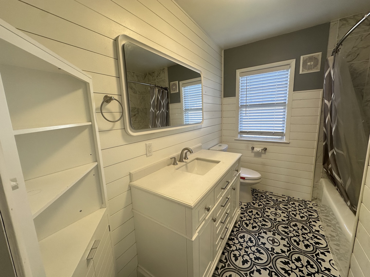 412 East Main Street Morrison, IL 61270 - Photo 17 of 23 a bathroom with a sink and a mirror