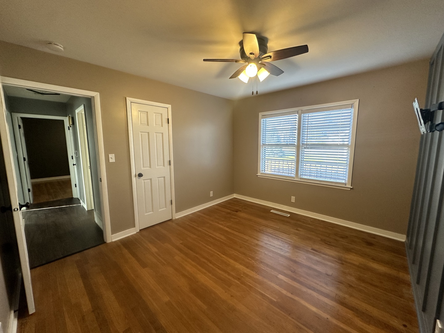 412 East Main Street Morrison, IL 61270 - Photo 19 of 23 a view of an empty room with a window