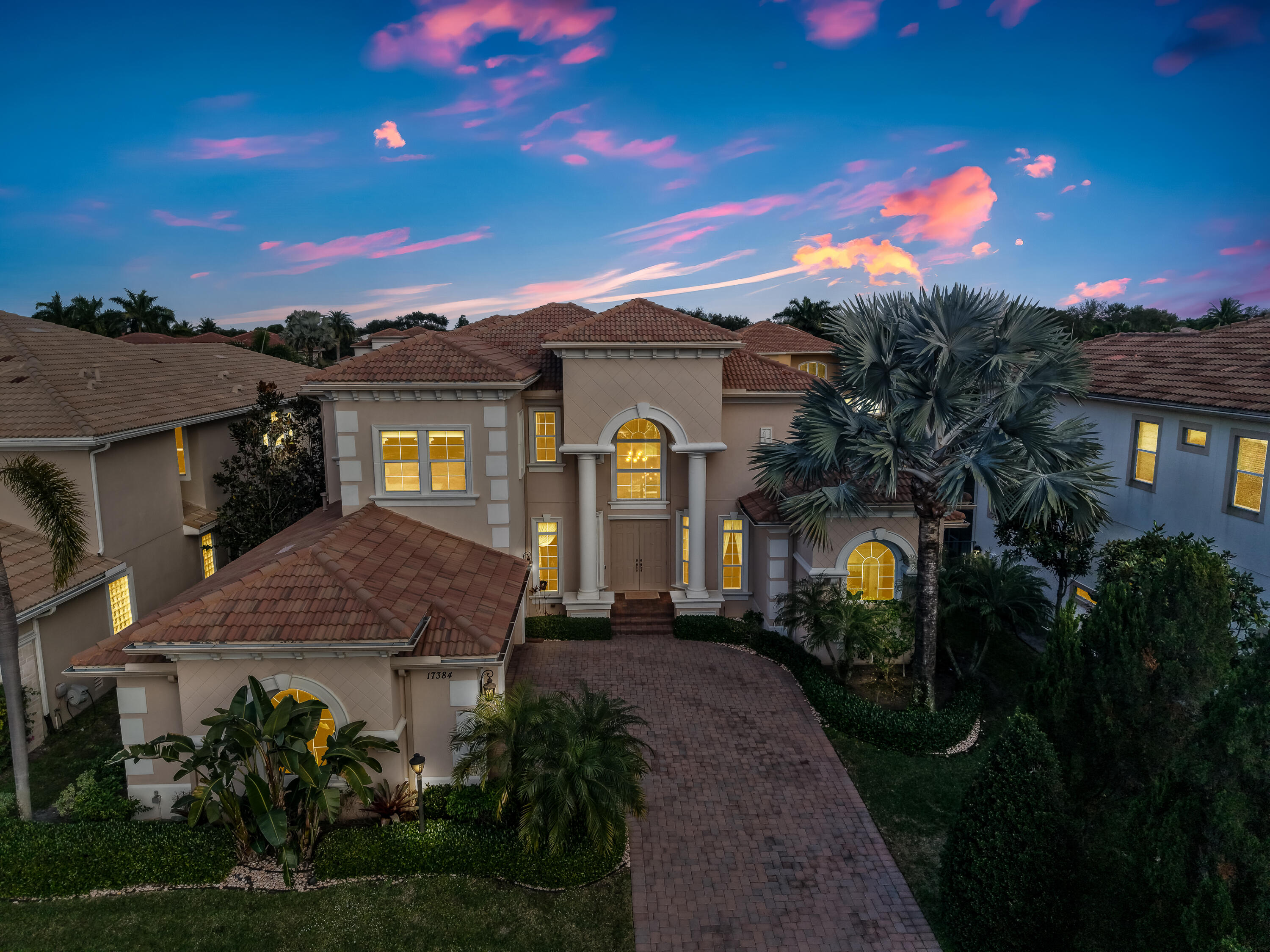 17384 Vistancia Circle Boca Raton, FL 33496 - Photo 1 of 52 a front view of a house with a yard