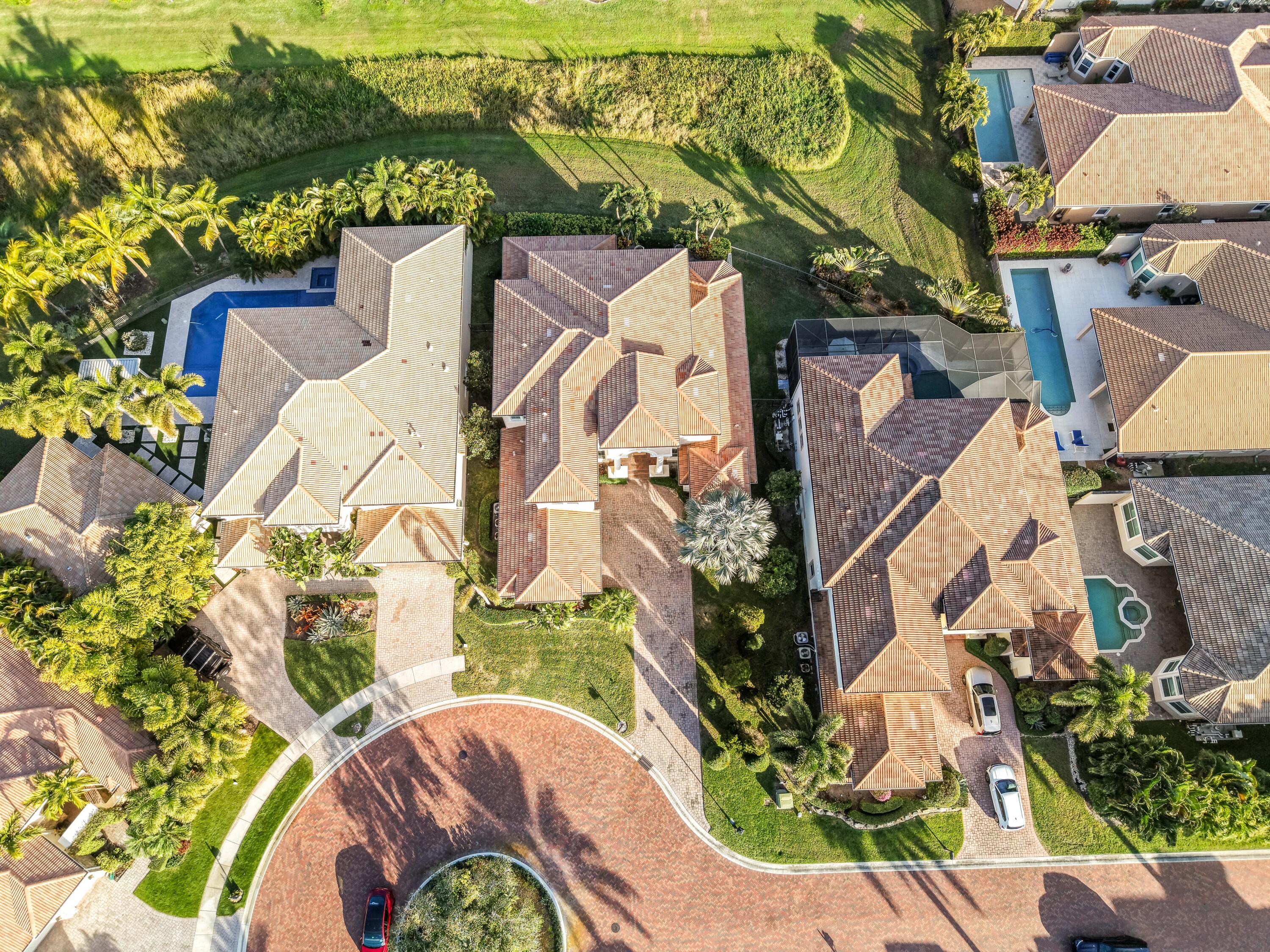 17384 Vistancia Circle Boca Raton, FL 33496 - Photo 2 of 52 an aerial view of a house with a yard and flowers