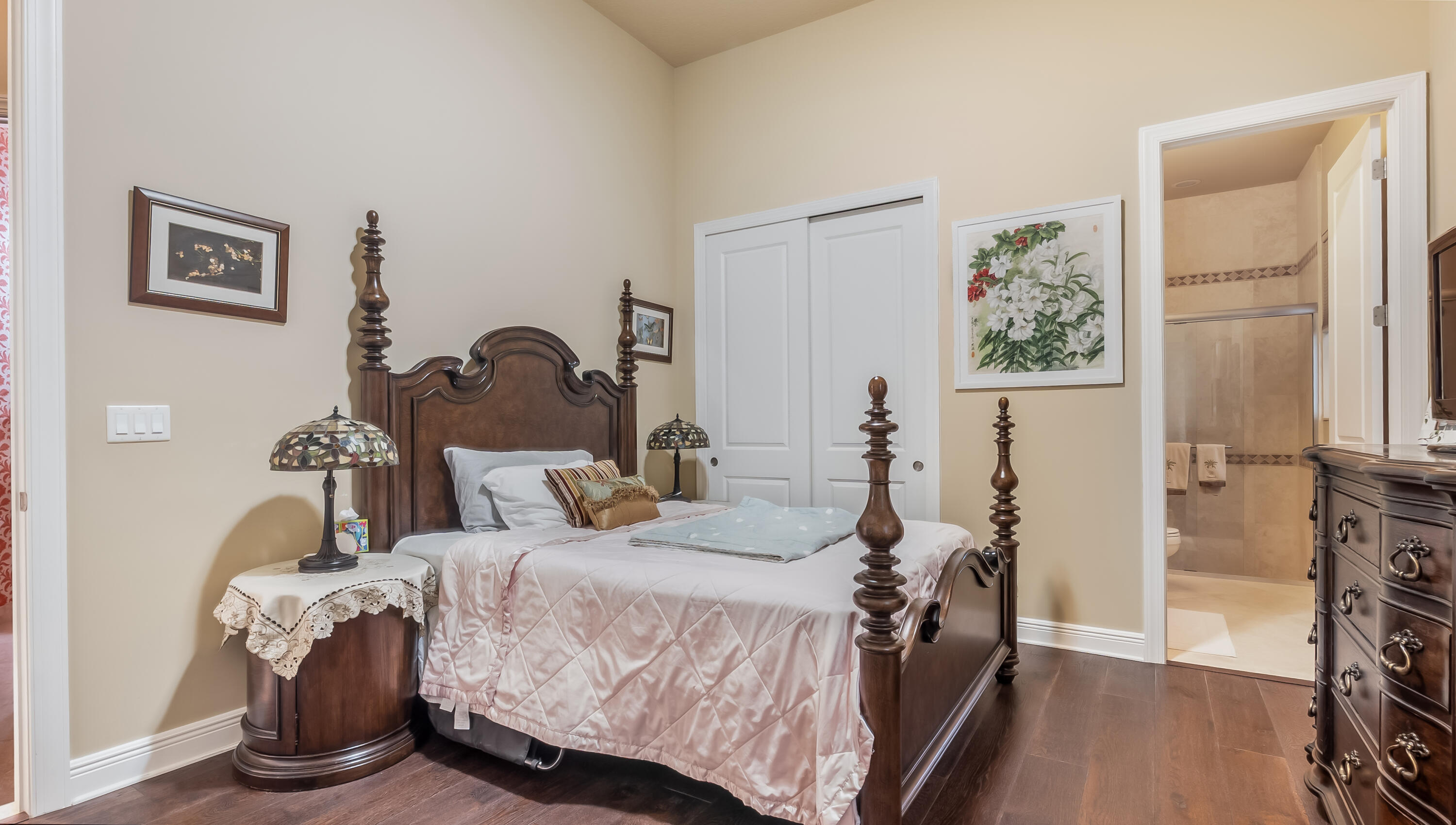 17384 Vistancia Circle Boca Raton, FL 33496 - Photo 23 of 52 a bedroom with a bed and a flat tv screen on the dresser