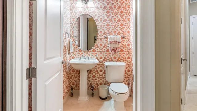 a kitchen with stainless steel appliances granite countertop a stove and a sink