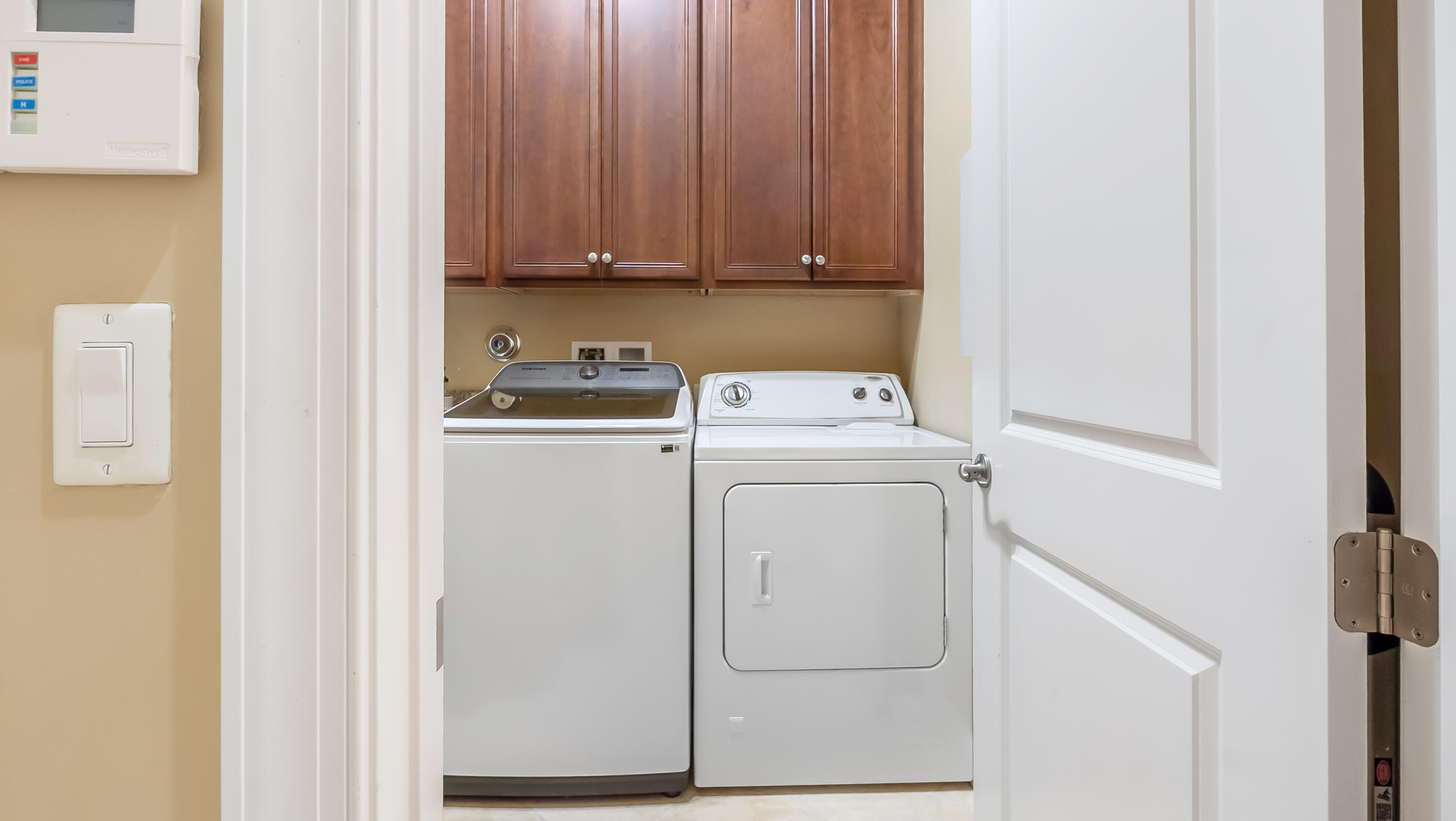 17384 Vistancia Circle Boca Raton, FL 33496 - Photo 25 of 52 a utility room with dryer and washer