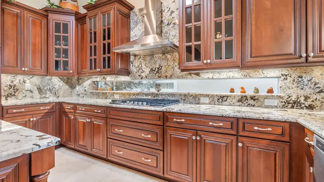 a very nice looking kitchen with a large window