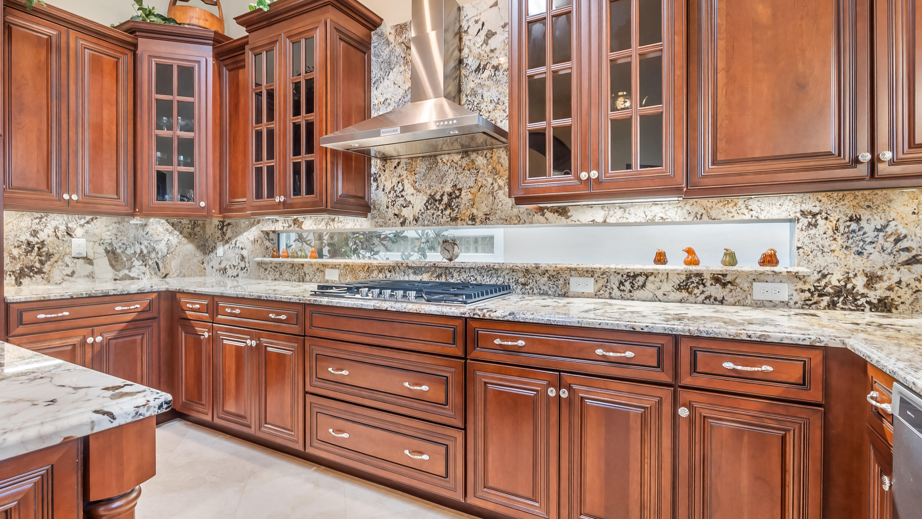 17384 Vistancia Circle Boca Raton, FL 33496 - Photo 29 of 52 a kitchen with granite countertop stainless steel appliances sink and cabinets