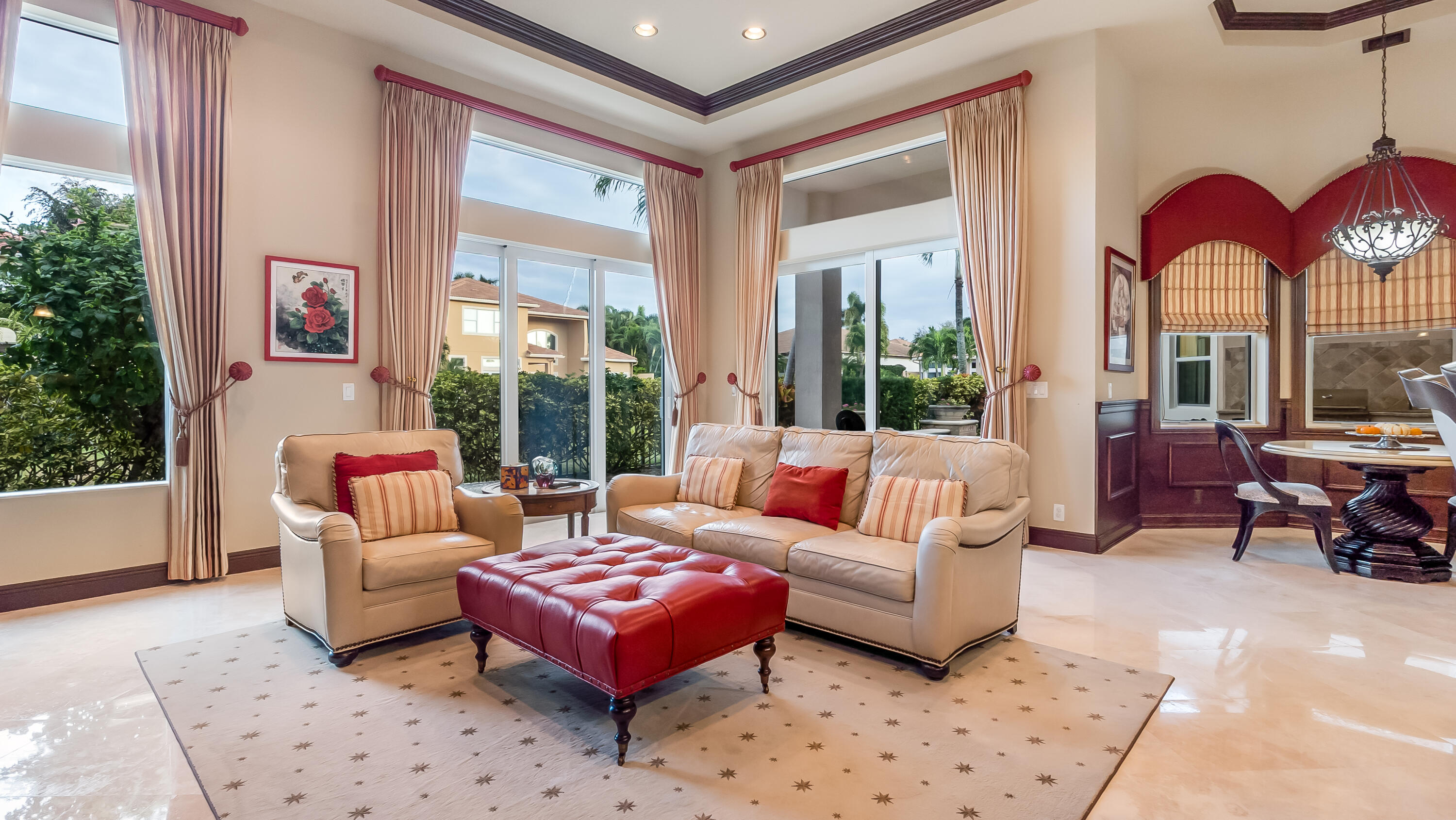 17384 Vistancia Circle Boca Raton, FL 33496 - Photo 33 of 52 a living room with furniture a couch and large windows