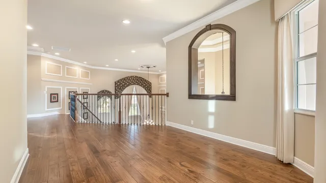 a room with a bed and a window