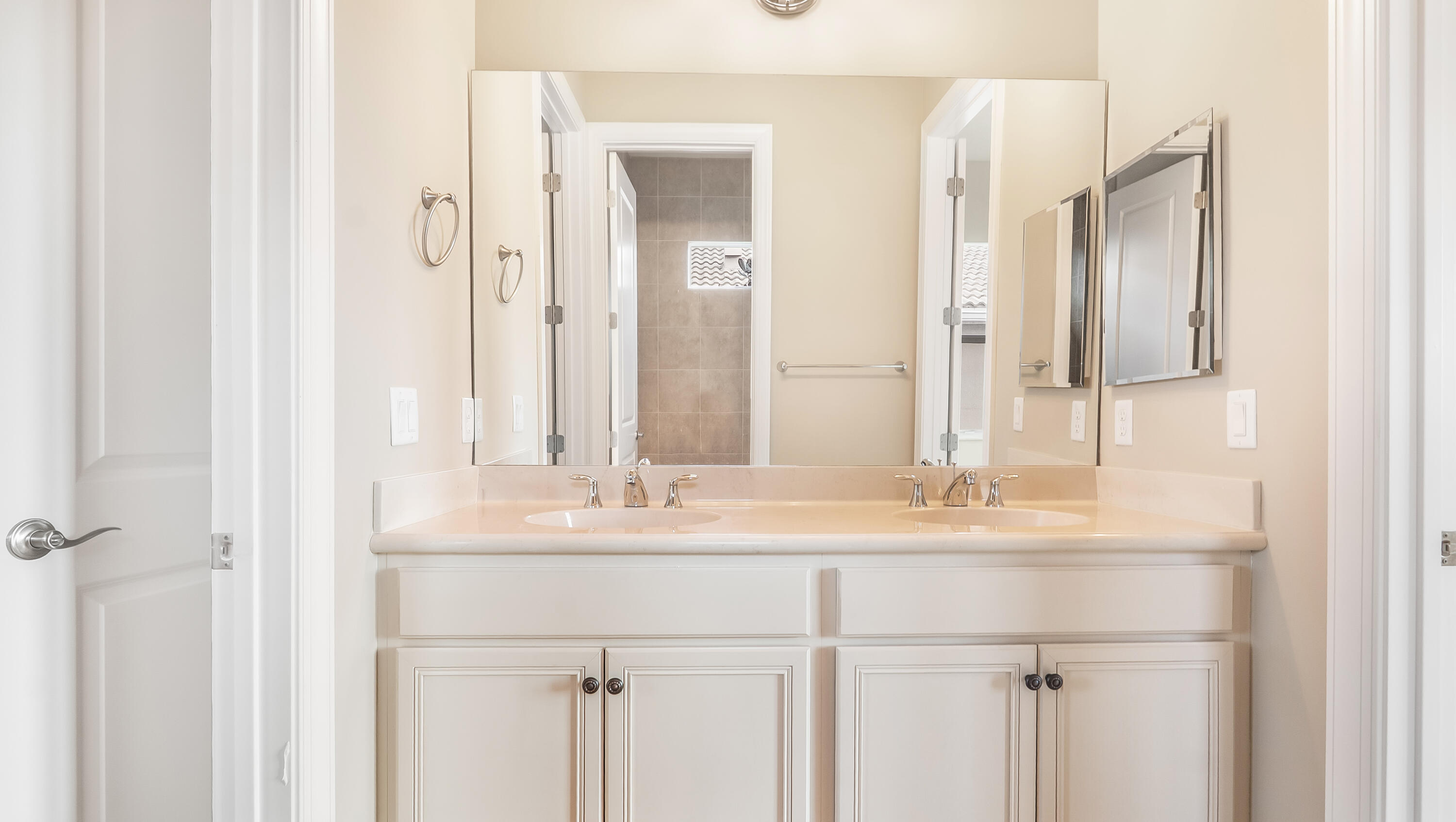 17384 Vistancia Circle Boca Raton, FL 33496 - Photo 41 of 52 a bathroom with a sink and a mirror