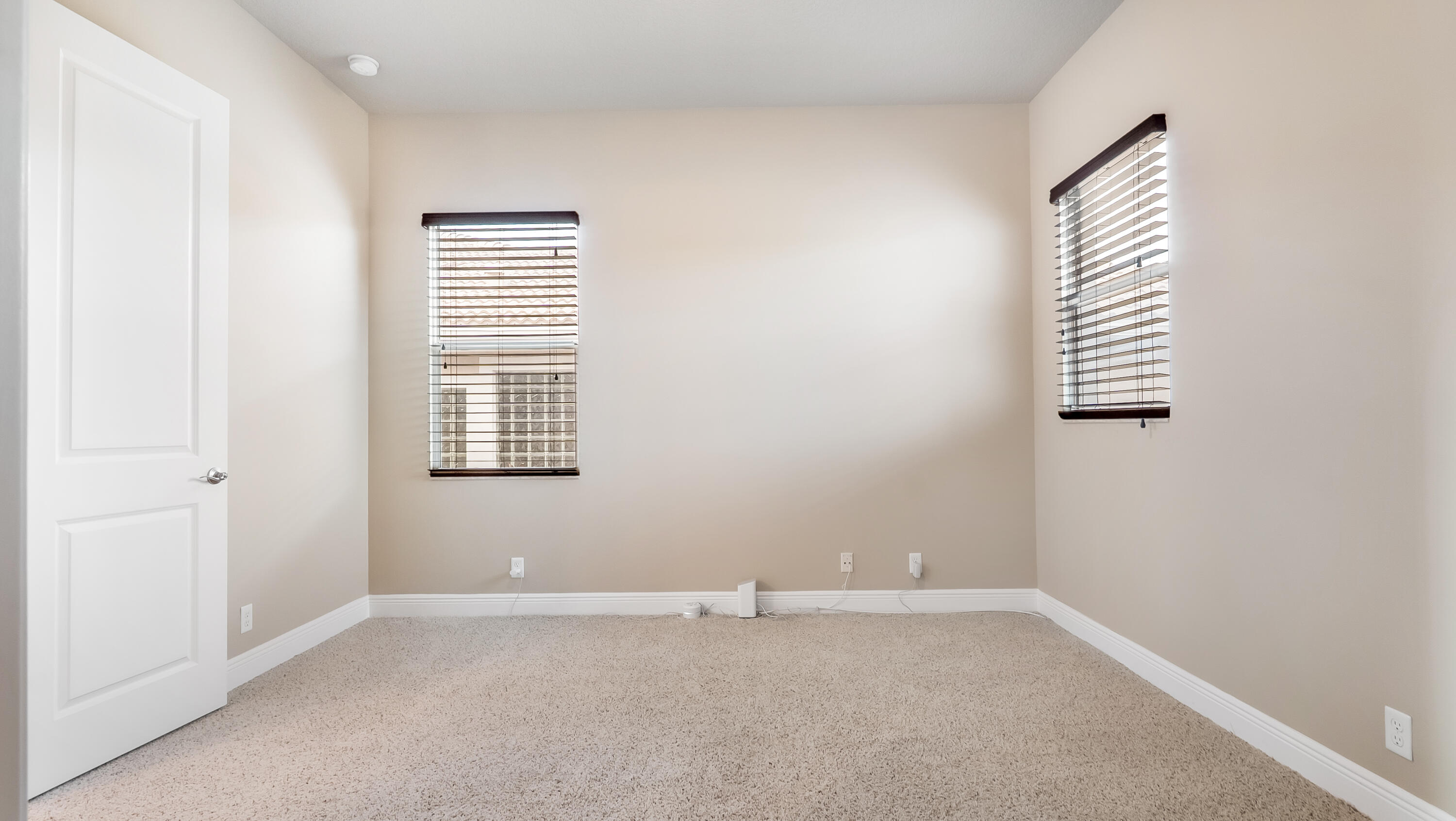 17384 Vistancia Circle Boca Raton, FL 33496 - Photo 43 of 52 an empty room with windows