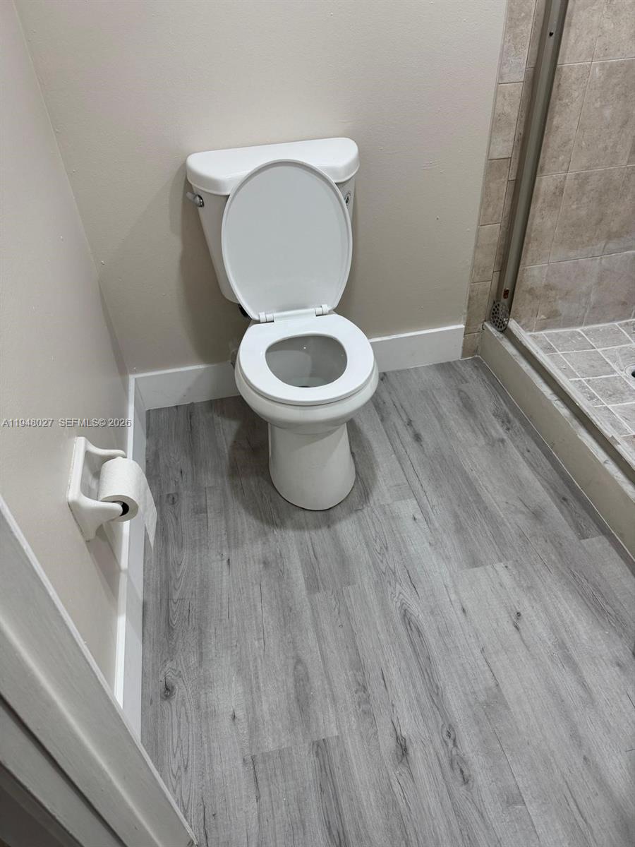 8051 South Colony Circle, Unit 210 Tamarac, FL 33321 - Photo 17 of 25 a bathroom with a toilet