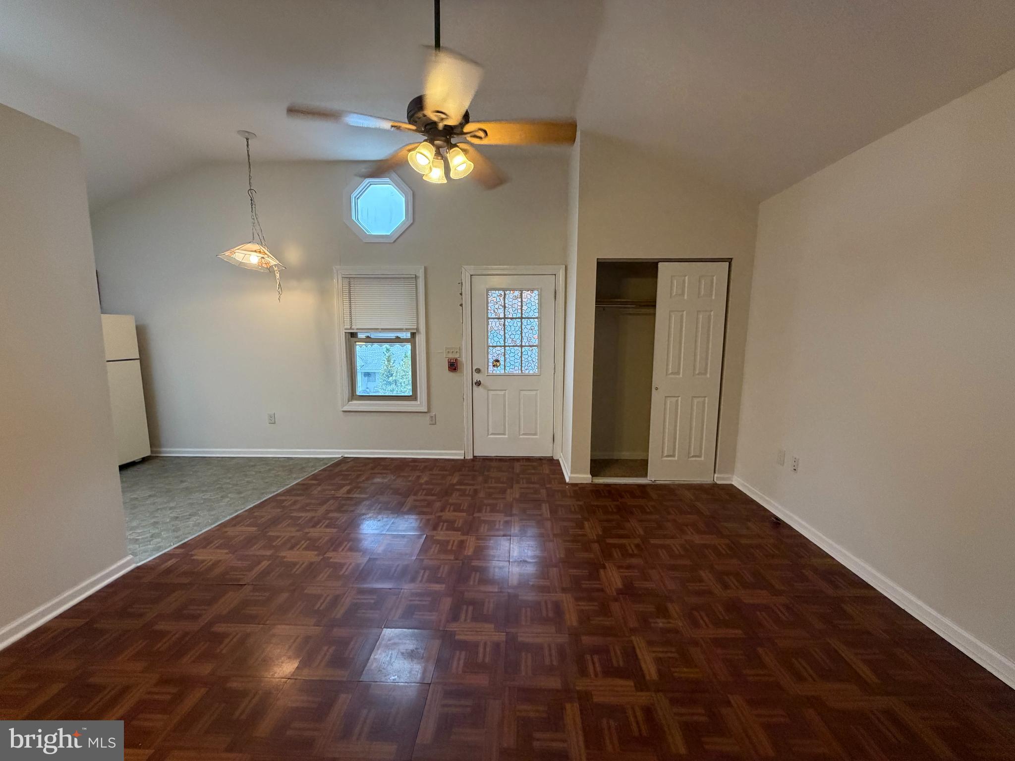 1015 North Providence Road Media, PA 19063 - Photo 7 of 15 a view of an empty room with window and wooden floor
