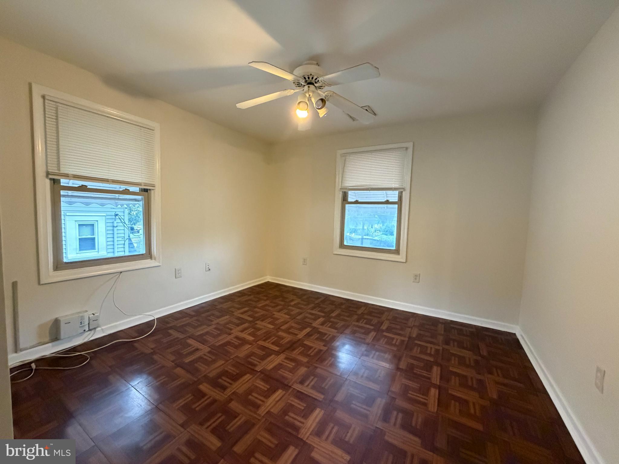 1015 North Providence Road Media, PA 19063 - Photo 9 of 15 wooden floor in an empty room with a window