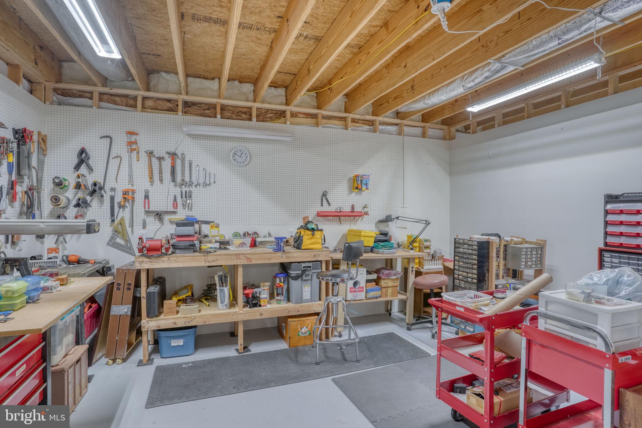 189 Nightingale Drive Milford, DE 19963 - Photo 62 of 71 Large Workshop/Craft Room with a pegboard